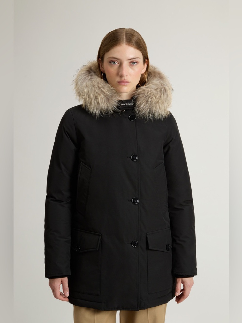 Women’s Woolrich Black Parka with Fur-Trim Hood, Size Medium.
